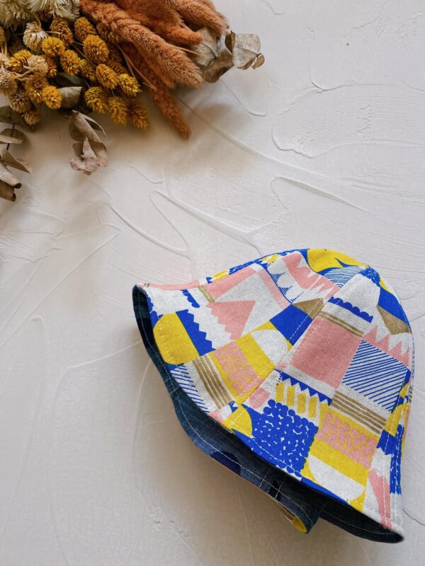 日本設計師布 幾何燙金雙面帽-48cm